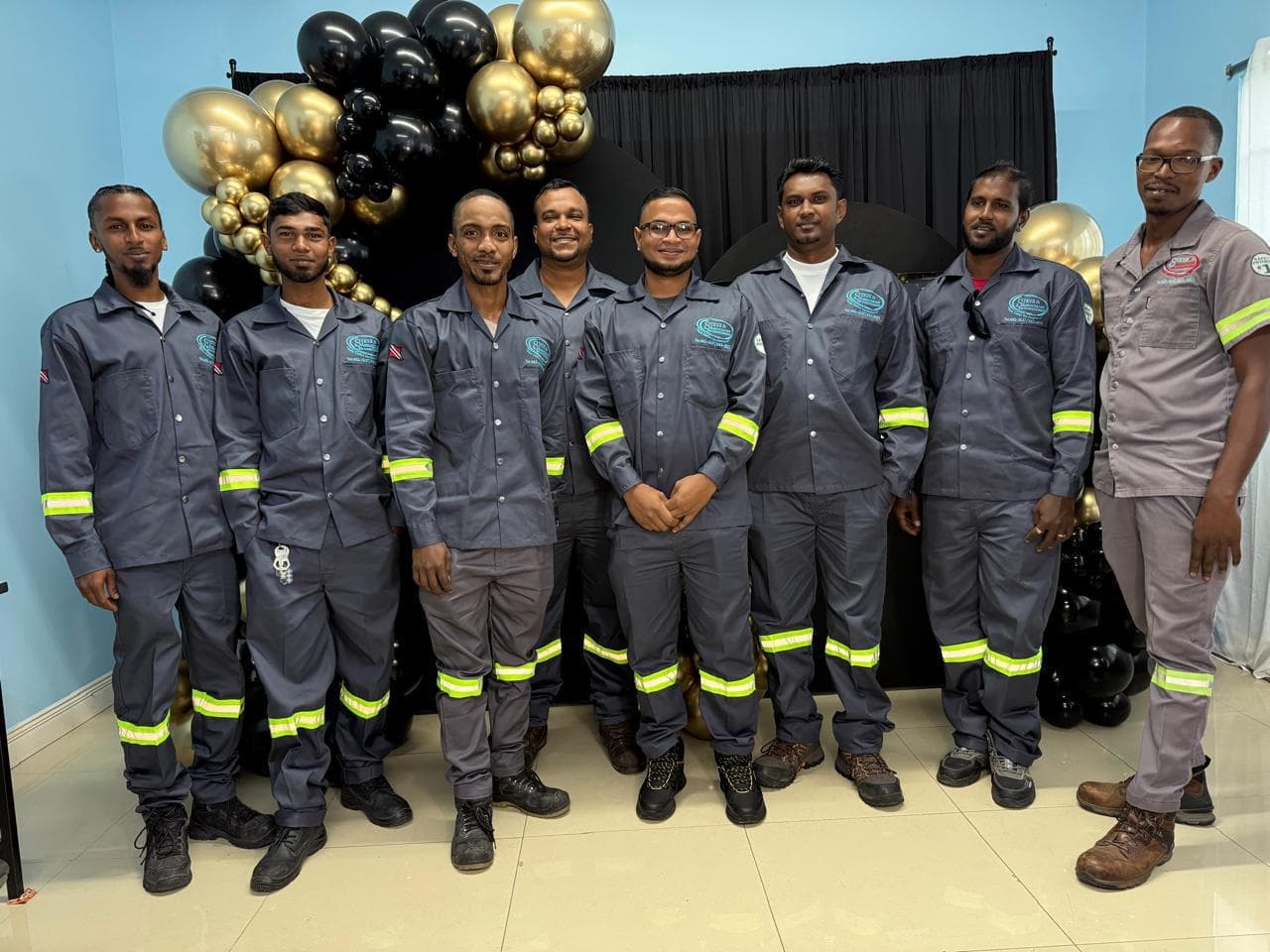 Certified Steve and Associates service team in red uniforms